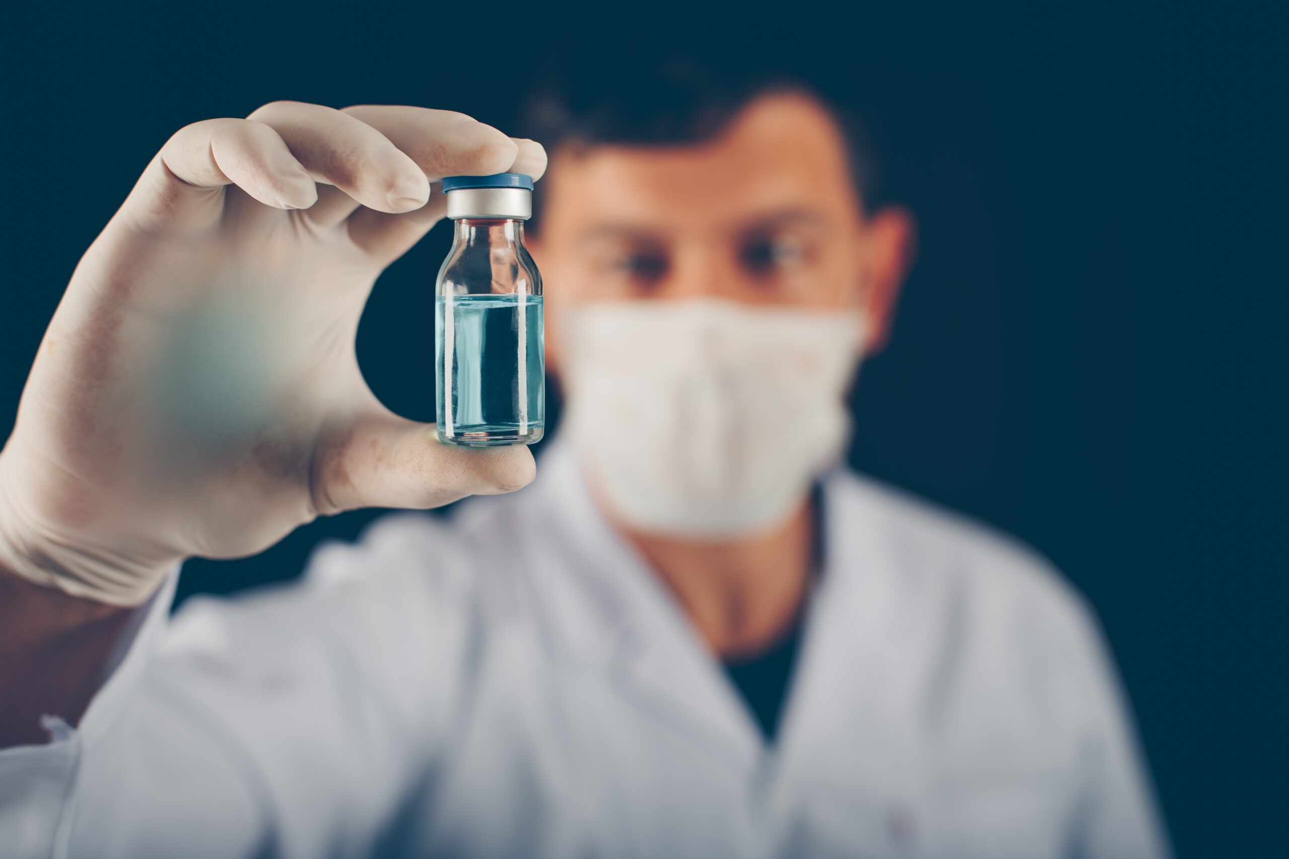 Research peptide vials stored in a laboratory freezer rack illustrating proper temperature-controlled storage