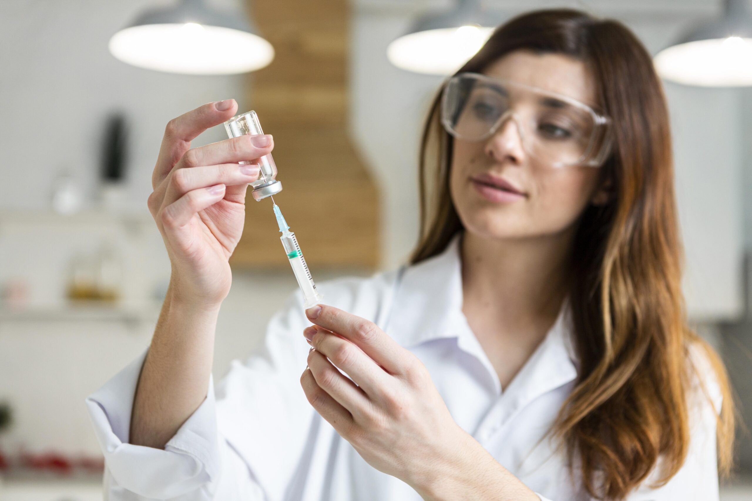 Tesamorelin research vial with a CT scan cross-section highlighting visceral adipose tissue reduction data